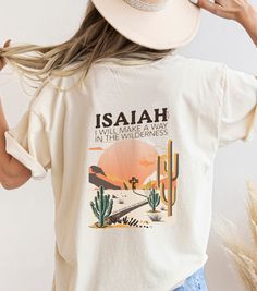 This unisex Boho Christian t-shirt features a beautiful design that showcases Isaiah 43:19 bible verse. With a soft and comfortable fabric, this tee is perfect for casual wear, whether you're at church, a Christian concert, shopping or sipping your favorite beverage and just while hanging with your friends. Rolled sleeves in picture is for styling purposes only. Printed on Cotton Bella and Canvas and Comfort Colors T-shirts (see colors in listing).  Make it an Oversized Tee for a current trendy Unisex T Shirt Design, What To Wear To A Christian Concert, Jesus Tshirt Design, Oversized T-shirt, Christian Shirt Ideas, Christian Tshirt Design Ideas, Printing On Tshirt, Trendy T Shirt Designs, Jesus T Shirts