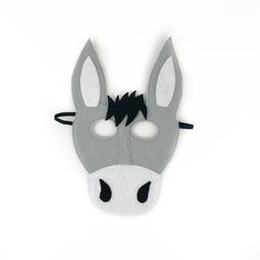 a donkey mask is shown on a white background