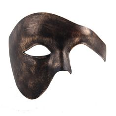 Our Phantom of the opera mask is inspired by one of the greatest shows of all time - The Phantom of the Opera, also known as Phantom. Our Phantom mask is the perfect choice for those making a phantom of the opera masquerade. Feel free to browse additional colors and styles including musical designs. We can supply these masks in bulk for your event. Phantom Masquerade Mask For Halloween, Phantom Color Masquerade Mask For Halloween, Halloween Masquerade Mask In Phantom Color, Full Face Theater Masks For Halloween, Halloween Theater Mask, Halloween Theater Masquerade Mask, Venetian Mask For Theater Halloween, Venetian Masks And Prosthetics For Halloween Theater, Artistic Eye Mask For Theater