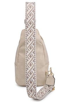 Get the best of both worlds with our Guitar Strap Sling Bag. This versatile bag is perfect for your everyday needs, providing convenient storage while keeping your hands free. It's durable, stylish, and essential for on-the-go. Guitar Strap Sling Bag Faux leather Zip top closure Gold-tone hardware Adjustable shoulder strap L 5.25 * H 9 * W 3 Daily Use Shoulder Bag With Adjustable Straps Sling, Beige Crossbody Hobo Bag With Adjustable Strap, Travel Shoulder Bag With Adjustable Straps And Sling Shape, Travel Sling Shoulder Bag With Adjustable Straps, Adjustable Crossbody Bags For On-the-go, Bags With Adjustable Handle For On-the-go, Beige Crossbody Chest Bag With Single Shoulder Strap, Daily Use Crossbody Backpack With Single Strap, Beige Bags With Adjustable Straps For Everyday Use