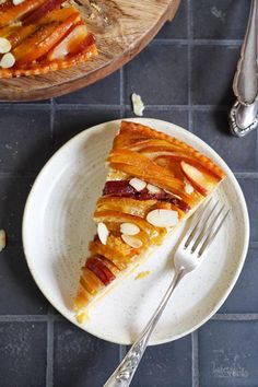 a slice of pie on a plate with a fork