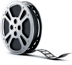 an old fashioned movie reel with a film strip attached to the side on a white background