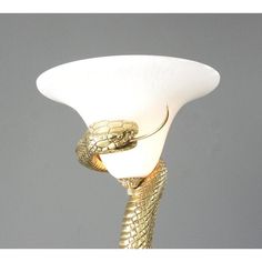 a lamp that has a snake on it