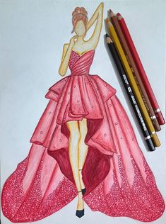 a drawing of a woman in a pink dress with two pencils next to it