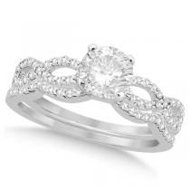 a white gold ring with an oval cut diamond in the center and two rows of round diamonds on each band