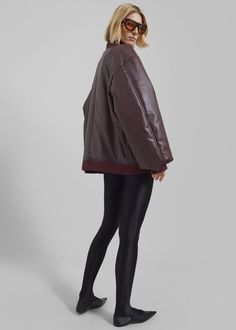 Astra Faux Leather Bomber Jacket - Burgundy – The Frankie Shop Fall Leather Jacket With Contrast Collar, Brown Outerwear With Ribbed Cuffs For Layering, Fall Brown Outerwear With Contrast Collar, Fall Outerwear With Contrast Collar For Work, Fall Workwear Outerwear With Contrast Collar, Versatile Brown Outerwear For Layering, Leather Outerwear With Ribbed Cuffs For Work, Brown Workwear Outerwear With Ribbed Cuffs, Fall Outerwear With Padded Collar For Layering