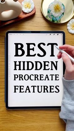 a person holding a pen in front of a sign that says best hidden procreate features