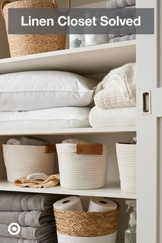 linen closet filled with baskets and blankets