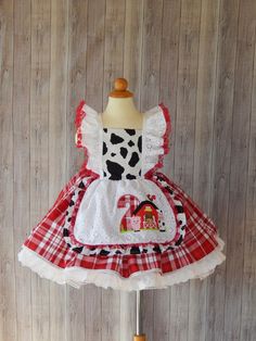 This beautiful dress is perfect for a birthday Farm theme party . The dress is made with 100% cotton fabric and all attention to detail This dress is made with 2 skirt layers, it has a farm appliqué with a birthday number that looks so cute on the dress just perfect for your little angel. The Dress is available from sizes 2 -8 years and available with a birthday number. Girls size Chest 2T 19'' 3T 21'' 4T 22'' 5T 23'' 6 24'' I use an underskirt just to show how puffy is the dress. if you want a Birthday Farm Theme, Farm Costumes, Farm Girl Outfits, Skirt Layers, Cow Dress, Woman Costumes, Animal Dress, Farm Themed Birthday Party, Farm Dress