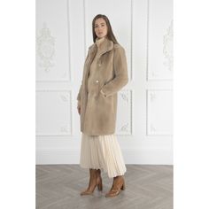 Beautifully crafted in our recycled softest faux fur, Bette is the trending coat at the top of our wish lists. This feminine, failsafe cover-up is dressed with a cosy stand collar and sumptuously deep pockets to create the ultimate all season essential. Throw on over denim for an easy everyday look, equally as elegant paired with a dress by evening. Cool. Classic. Considered. Timeless, love-forever styles we can’t quite live without - iconic silhouettes and luxurious staples that we’re proud to Faux Shearling Coat, Luxury Outerwear, Shearling Coat, Casual Dinner Outfit, Signature Collection, Independent Designers Fashion, Faux Fur Coat, Fur Collar, Ticks