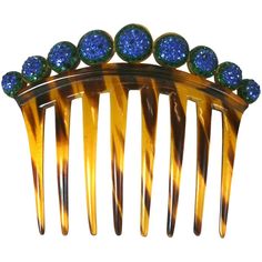 Art Deco Pave Ball Comb form the 1920's. Graduated half spheres are pave set with emerald and sapphire paste stones on top of a faux tortoiseshell comb. 1920's USA. 5" x 4" high. Excellent condition. Tortoise Shell Jewelry, Antique Hair Combs, Gold Fox, Art Deco Hair, Victorian Hairstyles, Vintage Hair Combs, Brown Jewelry, Charm Set, Girly Jewelry