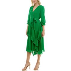 Add a fresh style for any occasion to your wardrobe with this Women's Bleecker 126 Faux Wrap Cascade Ruffle Midi Dress.Click on this WOMEN'S GUIDE to find the perfect fit and more! Add a fresh style for any occasion to your wardrobe with this Women's Bleecker 126 Faux Wrap Cascade Ruffle Midi Dress.Click on this WOMEN'S GUIDE to find the perfect fit and more! FEATURES Surplice neckline Ruffle 3/4-length sleeves with elastic cuffs Zipper back Cascading feminine ruffles Coordinating sash Asymmetri Flowy Ruffle Dress For Spring Party, Spring Midi Ruffle Dress With Pleats, Spring Midi Length Pleated Ruffle Dress, Fitted Green Ruffle Dress For Spring, Fitted Ruffle Dress For Spring Formal, Pleated Ruffle Midi Dress For Spring, Pleated Midi Length Ruffle Dress For Spring, Tiered Green Midi Dress For Party, Green V-neck Ruffle Dress For Spring