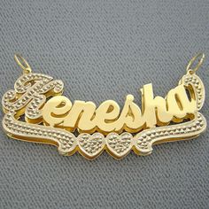 "*2 Inches Wide Personalized Solid 10K or 14K Gold Name Pendant 3D Double Plates Charm, fancy script unique font design, capitalized first letter and bottom heart design tail in white tone Rhodium hand carved diamond accent and lower cases letters finished in high-polished. *Average Name Pendant Dimension: 2 Inch (50 mm) X 3/4 Inch (19 mm) Approx. *Up to 9 Letters - Only first letter capitalized. *Thickness Top: 0.7 mm / 22 Gauge / 0.028\" Approx. *Thickness Bottom: 0.40 mm / 26 Gauges / 0.018\" Anniversary Nameplate Name Necklace With Hallmarks, Luxury Gold Name Necklace With Custom Name, Custom Gold Nameplate Jewelry, Customizable Gold Name Necklace For Formal Occasions, Luxury Gold Nameplate Necklace, Luxury Hallmarked Name Necklace For Anniversary, Luxury Gold Custom Name Necklace, Gold Nameplate Necklace For Anniversary, Gold Engraved Letter Name Necklace