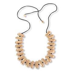 MarlaWynne Oval Bead Station Necklace Natural forms seem to inspire the beads that adorn this modern cord necklace.  Discover a simply intriguing statement style that's great solo and layered with other necklaces.       Approx. 55-3/16"L x 1/8"W; fits 29" to 48-7/8"     Worn finish (Goldtone, Silvertone); rubber finish (Black)      Black cord necklace with adjustable slide closure Modern Adjustable Single Strand Necklace, Adjustable Gold Necklace With Oval Beads, Gold Adjustable Necklace With Oval Beads, Black Cord Necklace, Station Necklace, Natural Forms, Cord Necklace, Long Necklace, Fashion Statement