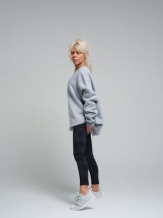 Elevate your casual wardrobe with the chic simplicity of our Relaxed Fit Viscose Sweatshirt. Crafted from luxuriously soft and sustainable viscose fabric, this sweatshirt offers an eco-friendly option that does not compromise on style or comfort. Designed for the modern woman on the go, the light heather grey hue complements a wide array of looks, seamlessly transitioning from your morning run to a casual coffee date.. FEATURES:A relaxed, oversized silhouette for a modern and effortless style. The drop shoulder design adds a laid-back charm, while the ribbed cuffs provide structure to the loose form.100% Handmade. SIZE & FIT: Fit: A relaxed fit with room to moveModel is wearing size Small or S/M View our SIZE CHART before ordering MATERIALS & CARE: Content: 65% Cotton, 35% Polyester Care: Oversized Versatile Sweater For Work, Versatile Oversized Sweater For Workwear, Versatile Long Sleeve Sweatshirt In Relaxed Fit, Versatile Long Sleeve Sweatshirt With Relaxed Fit, Versatile Sweater With Ribbed Cuffs And Relaxed Fit, Oversized Versatile Sweatshirt With Ribbed Cuffs, Oversized Cozy Workwear Tops, Versatile Oversized Sweatshirt With Ribbed Cuffs, Versatile Long Sleeve Sweatshirt With Ribbed Cuffs