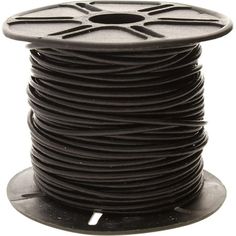 a spool of black wire on a white background