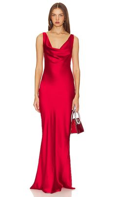 Find NORMA KAMALI Deep Drape Neck Gown In Red on Editorialist. Norma Kamali Deep Drape Neck Gown in Red. - size M (also in S, XL, XS, XXS) Norma Kamali Deep Drape Neck Gown in Red. - size M (also in S, XL, XS, XXS) Add a bit of glamour to your closet with Norma Kamali's Deep Drape Neck Gown in Tiger Red. The draped neckline and luxurious satin fabric make it the perfect choice for elegant events, ensuring you stand out with sophistication and style.. 100% polyester. Made in China. Hand wash. Ful Silk Fitted Maxi Dress For Red Carpet, Red Silk Maxi Dress For Red Carpet, Fitted Red Silk Gown, Red Silk Bias Cut Maxi Dress, Red Bias Cut Dress For Formal Occasions, Formal Red Bias Cut Maxi Dress, Red Bias Cut Dress For Wedding, Red Bias-cut Wedding Dress, Red Bias Cut Wedding Dress