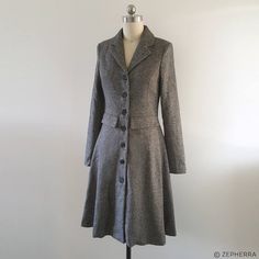 "DESCRIPTION Inspired by Kate Middleton's twill coat dress. Made in soft, twill herringbone wool, this coat dress is versatile as a dress and a coat. This fit and flare design features a tailored lapel, princess seam with a full skirt. Dress will be made to the details. *Can be made into white/ivory for winter wedding coat. Handmade on order request. We only use high quality fabrics and notions to ensure that you will get a dress that fits comfortably and last a long time. Custom to your size an Fitted A-line Fall Outerwear, Formal Fitted A-line Wool Coat, Fitted Tweed Wool Coat With Long Sleeves, Elegant Fitted Herringbone Outerwear, Elegant Fitted Tweed Wool Coat, Fitted Tweed Wool Coat, Fitted Tweed Wool Coat For Work, Tailored Long Sleeve Tweed Dress For Winter, Single Breasted Tweed Dress For Fall Office Wear