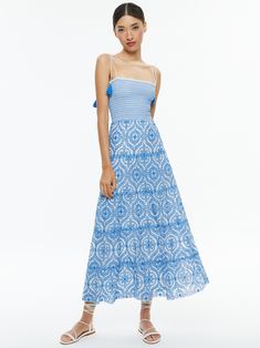 Marna Tiered Midi Tie Strap Dress In Off White/french Blue | Alice + Olivia Bohemian Maxi Dress With Smocked Bodice For Casual Wear, Maxi Dress With Smocked Back And Spaghetti Straps, Spaghetti Strap Maxi Dress With Smocked Back, Brunch Dress With Tie Straps And Tiered Skirt, Spaghetti Strap Maxi Sundress With Smocked Bodice, Spaghetti Strap Smocked Bodice Sundress, Beach Midi Smocked Dress With Adjustable Straps, Smocked Bodice Sundress With Spaghetti Straps, Bohemian Smocked Dress With Ruffled Straps