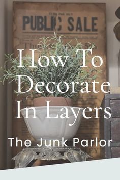 a potted plant with the words how to decorate in layers on top of it