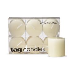 the votives set is packaged in a clear box and has four white candles