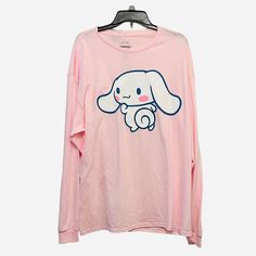 Sanrio Cinnamoroll Character Graphic Long Sleeved T-Shirt (Xl) Condition: Brand New Without Tags Color: Pink Style: Long Sleeve Logo Labeled Sleeve Note: Please View All Photos Carefully For Item Description. Thank You. Kawaii Relaxed Fit Tops For Spring, Kawaii Cotton Tops For Loungewear, Cotton Kawaii Tops For Loungewear, Kawaii Cartoon Print Tops For Loungewear, Cute Cartoon Print Tops For Loungewear, Cute Tops With Cartoon Print For Loungewear, Kawaii Long Sleeve Loungewear Top, Kawaii Long Sleeve Tops For Loungewear, Cute Long Sleeve Cotton T-shirt