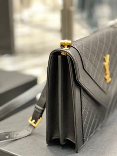 Description S.L Gaby Satchel Bag In Black With Gold Toned Hardware For Women 10.2in/26cm 6688631EL071000 Rep 1:1 Size: 26 x 18 x 5 cm / 10.2 X 7 X 2 inches Black Snap Closure Small compartment Gold-toned metal hardware Gaby Satchel with a front flap Include dust bag. This product is of the best quality. The production time is 3-5 working day. You’ll received the parcel within 14-17 business days. Yves Saint Laurent Bags, Saint Laurent Bag, Gold Tone Metal, Satchel Bags, Contact Us, Yves Saint Laurent, Fashion Bags, New Zealand, Paper Bag