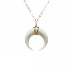 "White bone double horn is wrapped in 14k gold fill, 14k rose gold fill, or sterling silver wire and hangs on a 14k goldfill, 14k rose gold fill, or sterling silver chain. The pendant measures 3/4ths of an inch in width. If you want it on a satellite chain, then order it here: https://www.etsy.com/listing/524813150/small-white-bone-double-horn-gold You can choose the length you want when you checkout. If you want a size smaller than 16 inches, let me know when you checkout. You can make the neck Unique Crescent Shaped White Jewelry, Unique White Crescent Jewelry, White Crescent Handmade Necklace, Handmade White Crescent Necklace, White Crescent Bohemian Jewelry, Bohemian White Crescent Jewelry, Minimalist White Moon Shaped Jewelry, Minimalist White Moon-shaped Jewelry, Minimalist White Crescent Jewelry