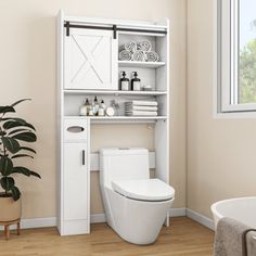 a white toilet sitting next to a bath tub in a bathroom with wooden floors and walls