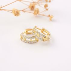 Hoop Earring 18K 14K 10K Pair Huggie Simulated Pave Diaomonds Solid Gold Latch Back Earring 18K 14K 10K  Swarovski CZ (Cubic Zirconia) * 100% 10K 14k 18K Solid Yellow Gold (Not Gold Vermail or Not Gold Plated) * Sold as Pair * Cubic Zirconia clear simulated diamonds * 0.50inch outer, 0.40inch inner diameter *     13mm outer,      10mm inner diameter * Hinge hoops click in place for a secure comfortable fit * Polished finish EU and UK taxes; *EU and UK orders over £135/€150 are subject to customs, import duties and tax charges once they reach their destination. This means that the recipient will be responsible for all customs, import duties and sales taxes that may apply locally to the purchase. Gold Huggie Earrings With Prong Setting, Gold Hoop Earrings With Prong Setting As Gift, Gold Small Hoop Ring With Prong Setting, Gold Rings With Prong Setting And Small Hoop, Gold Plated White Gold Huggie Earrings, Gold Huggie Earrings With Vvs Clarity, Gold Huggie Rings For Anniversary, Gold Plated Huggie Earrings With Prong Setting, 14k Gold Huggie Earrings With Vvs Clarity Diamonds