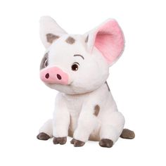 a small stuffed pig sitting on top of a white floor