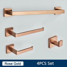 the rose gold bathroom accessories set includes four handles, two towel bars and one toilet paper holder