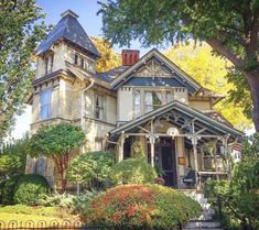 an old victorian house in the fall