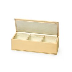 an open box with three compartments on the inside