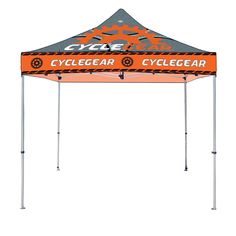 an orange and gray tent with the word cycle gear on it's side, against a white background