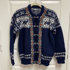 Size Large. Navy With White Winter Pattern. Open Front Jacket With Silver Metal Closures. Heavy Weight Wool. Euc. No Trades. J3 Blue Fair Isle Pattern Outerwear For Fall, Fitted Nordic Style Winter Outerwear, Blue Fair Isle Outerwear For Fall, Blue Fair Isle Pattern Fall Outerwear, Fitted Nordic Outerwear With Fair Isle Pattern, Nordic Fitted Outerwear For Fall, Nordic Style Fitted Fall Outerwear, Nordic-style Fitted Fall Outerwear, Nordic Style Fitted Long Sleeve Outerwear