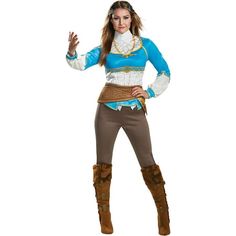 a woman in a costume is posing for the camera with her hands out and wearing boots