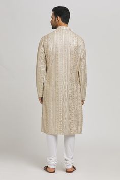 Ivory and gold cotton kurta with sequins and thread embroidery. Comes with churidar. - Aza Fashions Gold Straight Kurta Churidar For Reception, Gold Churidar With Straight Kurta For Reception, Festive Sherwani With Gold Embroidery For Festivals, Gold Chanderi Kurta With Intricate Embroidery, Gold Straight Kurta For Reception, Traditional Gold Sherwani With Gota Work, Gold Churidar For Reception In Transitional Season, Festive Gold Sherwani With Gota Work, Semi-stitched Kurta With Gold Embroidery For Festivals