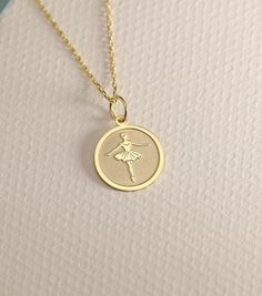 14K Real Solid Gold ballerina gold necklace ● Material of pendant: Solid Gold 14k ( REAL GOLD ) ● Metal Stamp: 14L ( REAL GOLD ) ● The pendant is available in 6 sizes: - 14,0 mm / 0,55 inches ( Diameter ) In the photos - 15,3 mm / 0.60 inches ( Diameter ) - 16,5 mm / 0,65 inches ( Diameter ) - 19,1 mm / 0,75 inches ( Diameter ) - 21 mm / 0,82 inches ( Diameter ) - 23 mm / 0.90 inches ( Diameter ) ( In the photos the size is 14mm / 0.55 inches Diameter ) ( Jump Ring inner diameter: 4 mm ) ● Mater Dancer Necklace Pendants, Ballet Jewelry, Dancer Necklace, Ballerina Necklace, Ballerina Jewelry, Ballet Birthday, Jewelry Personalized, Ballet Dancer, Gold Charm