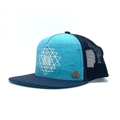 Made In Mexico One Size Fits Most Unisex Adjustable Snapback 5-panel Low-Profile Design with Mesh Back Spot Clean with Water Take our intergalactic Sri Yantra graphic print Visions Hat on your next adventure. Our eco-friendly trucker hats are made from upcycled and recycled materials. The five-panel Visions Sky Trucker Hat has a low-profile design with a navy-blue flat bill. The background design on the front of the hat extends to the underside of the brim. Black mesh back with adjustable snap f Navy Blue Flats, Sri Yantra, Profile Design, State Of The Art, Hat Making, Black Mesh, Inspirational Quote, Trucker Hats, Background Design