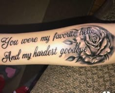 a woman's arm with a rose tattoo on it and the words you were my favorite hello and my harder goodbye