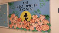 a bulletin board that says the great pumpkin is coming