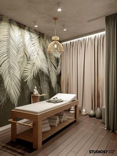 a spa room with a table and towels on it