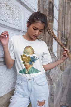 "Van Gogh surreal head Unisex T-shirt This oroginal collage from several Van Gogh paintings made by \"Silentium\" team. * 100% combed and ring-spun cotton * Fabric weight: 4.2 oz (142 g/m2) * Pre-shrunk fabric * Shoulder-to-shoulder taping * Side-seamed Printing technique - Direct to Garment Care instructions: * Machine wash cold, inside-out, gentle cycle with mild detergent and similar colors. Use non-chlorine bleach, only when necessary. No fabric softeners * Tumble dry low, or hang-dry for lo Artsy Artwork T-shirt For Summer, Artsy Summer T-shirt With Artwork, Artsy Summer T-shirt, Spring Aesthetic Graphic Print T-shirt, Spring Aesthetic Graphic T-shirt, Artistic Summer Tops With Artwork, Artsy Summer Tops With Artwork, Artistic Tops With Artwork For Summer, Artsy Artwork Summer Tops