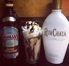 an ice cream sundae next to two bottles of rumchata