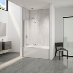 a bathroom with a sink, mirror and bathtub next to the shower door is shown