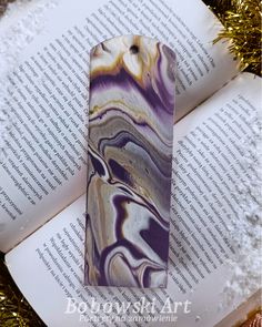 Wooden hand-painted bookmark.