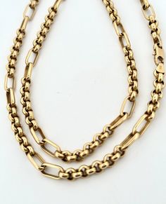 This vintage 14k yellow gold necklace is a true gem. Made in Italy, the chain is 24.5 inches long and weighs 18.2 grams. The necklace features a classic chain style and is crafted from high-quality yellow gold. With no stone, this necklace is perfect for everyday wear or as a special gift. The 14k metal purity ensures the necklace will last for years to come. Add this beautiful piece to your jewelry collection today. 5.5mm thick Classic 14k Gold Necklace With Rectangular Links, Classic Oval Gold Chain Necklace, Formal 14k Gold Link Chain Necklace, Classic Long Chain Necklace For Formal Occasions, Classic 14k Gold Oval Chain Necklace, Classic Oval 14k Gold Chain Necklace, Formal 14k Gold Oval Link Chain Necklace, Classic Gold Chain Necklace For Formal Occasions, Classic Gold-tone Necklace For Formal Occasions