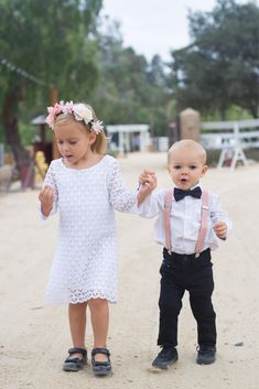 "Your guy will be the talk of the event when he arrives sporting these sweet blush wedding suspenders and black bow tie! Perfect for a wedding outfit, ring bearer outfit, 1st birthday outfit, parties, cake smash or family photo shoot! This 100% cotton bow tie is double layered and reinforced with interfacing so it will hold its form well. The bow ties come in 2 attachment options- on an alligator clip (best for squirmy little guys) or an adjustable elastic neckband (best for older kids). See ima Black Ring Bearer, Baby Boy Bow Tie, Wedding Suspenders, Suspenders And Bow Tie, Pink Suspenders, Baby Suspenders, Suspenders Wedding, Bearer Outfit, Ring Bearer Outfit