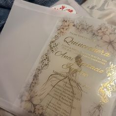 a wedding card with an image of a woman in a white dress on the front